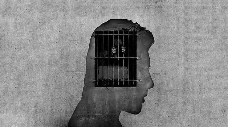 Image of a person imprisoned in his mind